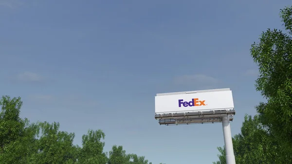 Doğru reklam billboard Fedex logosu ile sürüş. Editoryal 3d render — Stok fotoğraf