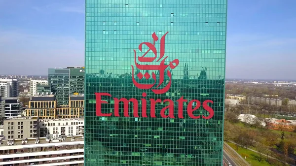 Aerial shot of office skyscraper with Emirates Airline logo. Modern office building. Editorial 3D rendering — Stock Photo, Image
