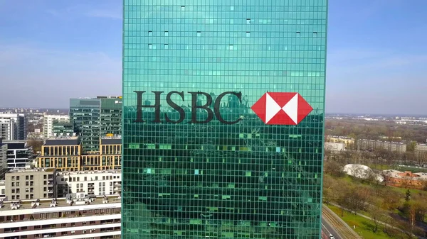 Aerial shot of office skyscraper with HSBC logo. Modern office building. Editorial 3D rendering — Stock Photo, Image