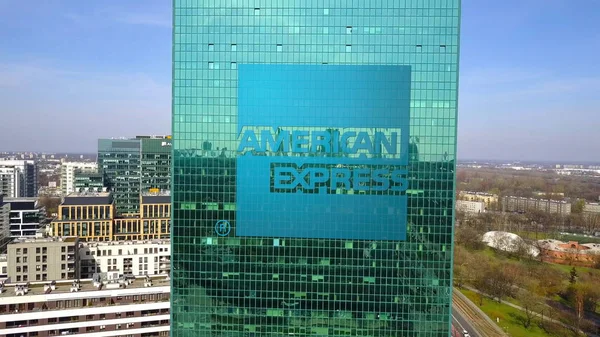 Aerial shot of office skyscraper with American Express logo. Modern office building. Editorial 3D rendering — Stock Photo, Image