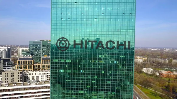 Aerial shot of office skyscraper with Hitachi logo. Modern office building. Editorial 3D rendering — Stock Photo, Image