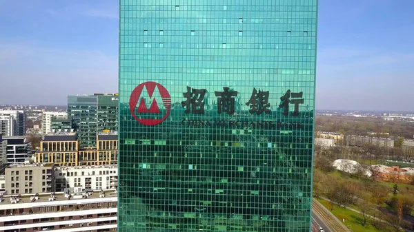 Aerial shot of office skyscraper with China Merchants Bank logo. Modern office building. Editorial 3D rendering — Stock Photo, Image