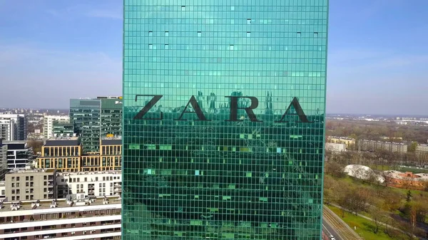 Aerial shot of office skyscraper with Zara logo. Modern office building. Editorial 3D rendering — Stock Photo, Image