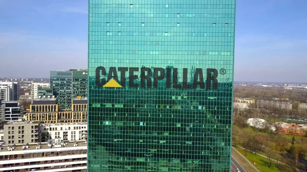 Aerial shot of office skyscraper with Caterpillar Inc. logo. Modern office building. Editorial 3D rendering — Stock Photo, Image