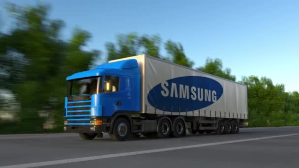 Vracht semi vrachtwagen met Samsung logo rijden langs bos weg, naadloze loops. Redactioneel 4k clip — Stockvideo