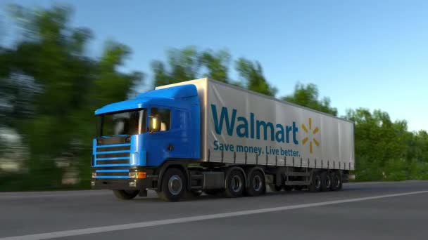 Ημι φορτηγό φορτίου με λογότυπο Walmart οδήγηση κατά μήκος το δασικό δρόμο, αδιάλειπτη βρόχο. Συντακτική 4k κλιπ — Αρχείο Βίντεο