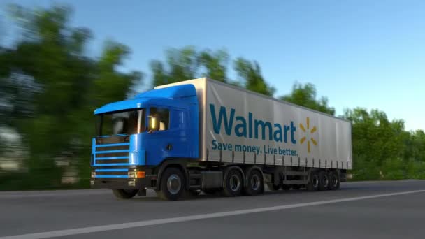 Truk barang semi dengan logo Walmart mengemudi sepanjang jalan hutan, loop mulus. Klip Editorial 4K — Stok Video