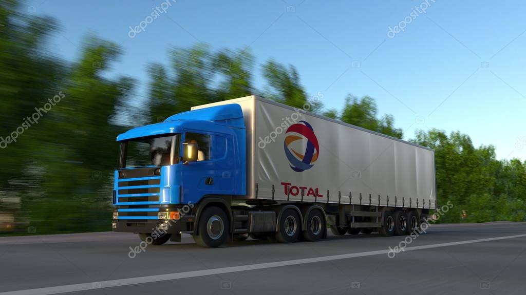Freight semi truck with Total S.A. logo driving along forest road. Editorial 3D