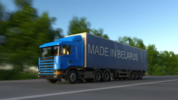 Snelheidsovertredingen vracht semi vrachtwagen met gemaakt In Wit-Rusland bijschrift op de aanhangwagen. Lading wegvervoer. 3D-rendering — Stockfoto