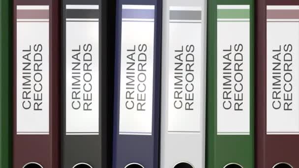 Múltiples carpetas de oficina con etiquetas de texto de registros criminales Representación 3D — Vídeo de stock