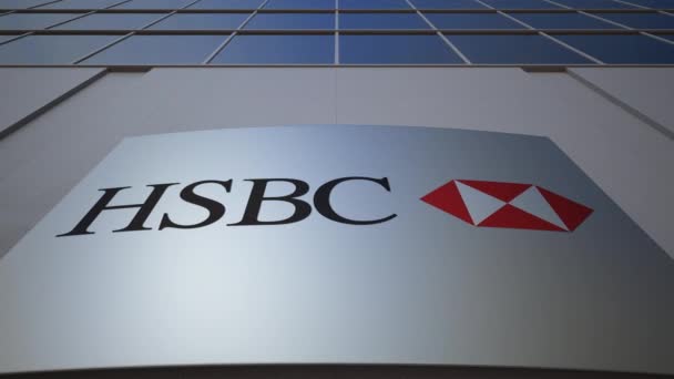 Наружная вывеска с логотипом HSBC. Современное офисное здание. Редакционная 3D рендеринг — стоковое видео