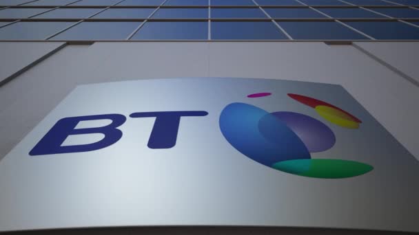 Outdoor signage board with BT Group logo. Modern office building. Editorial 3D rendering — Stock Video