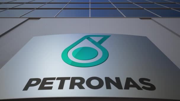 Εξωτερική σήμανση σκάφους με λογότυπο Petroliam Nasional Berhad Petronas. Κτίριο σύγχρονων γραφείων. Συντακτική 3d rendering — Αρχείο Βίντεο