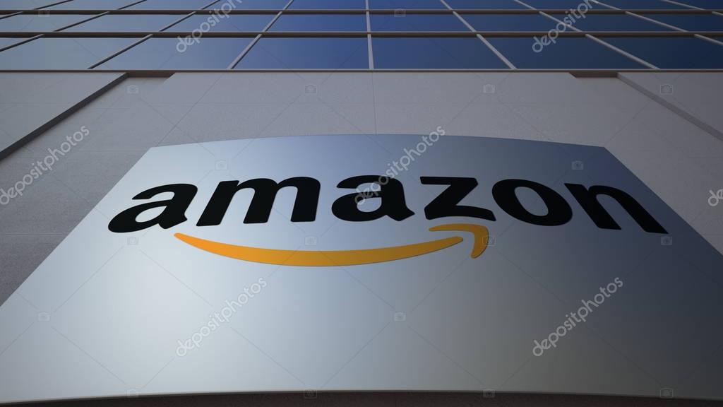 Outdoor signage board with Amazon.com logo. Modern office building. Editorial 3D