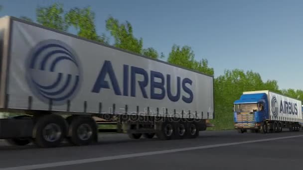 Tavarankuljetusajoneuvot, joissa Airbus-logo ajaa metsätietä pitkin, saumaton silmukka. Toimituksellinen 4K-leike — kuvapankkivideo