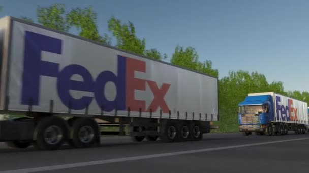 Підлозі вантажних автомобілів з логотип Fedex, проїжджаючи по лісовій дорозі, безшовні петлю. Редакційні 4 к кліп — стокове відео