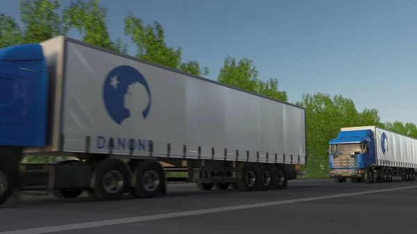 Vracht semi vrachtwagens met Danone logo rijden langs bos weg. Redactioneel 3D-rendering — Stockfoto