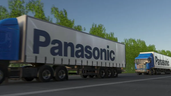 Vracht semi vrachtwagens met Panasonic Corporation logo rijden langs bos weg. Redactioneel 3D-rendering — Stockfoto