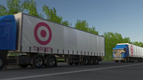 Підлозі вантажних автомобілів з логотипом цільової корпорації, проїжджаючи по лісовій дорозі. Редакційні 3d-рендерінг — стокове фото