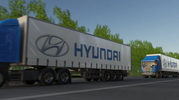 Vracht semi vrachtwagens met Hyundai Motor Company logo rijden langs bos weg. Redactioneel 3D-rendering — Stockfoto