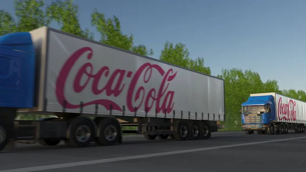 Vracht semi vrachtwagens met Coca-Cola logo rijden langs bos weg. Redactioneel 3D-rendering — Stockfoto