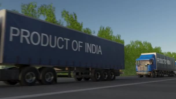 Semicamiones de carga en movimiento con leyenda PRODUCTO DE INDIA en el remolque — Vídeo de stock
