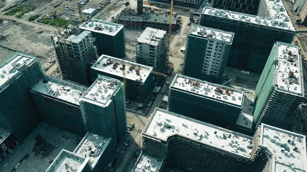 Aerial shot of modern apartment buildings construction site — Stock Photo, Image