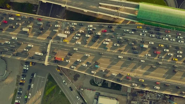 Aerial top down view shot of traffic jam on both sides of a highway in the evening rush hour — Stock Photo, Image