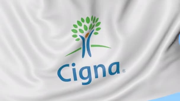 Lambaikan bendera dengan logo Cigna. Animasi editorial Seamles loop 4K — Stok Video