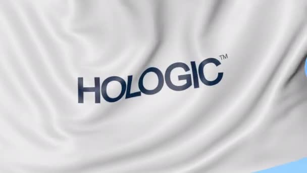 Macha flagą z Hologic logo. Seamles pętli 4k redakcji animacji — Wideo stockowe