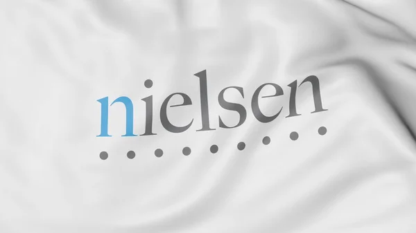 Размахиваю флагом с логотипом Nielsen Holdings. Редакционная 3D рендеринг — стоковое фото