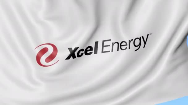 Macha flagą z logo Xcel energii. Seamles pętli 4k redakcji animacji — Wideo stockowe