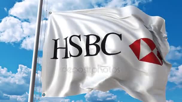Bulutlar hareket karşı Hsbc logolu bayrak sallıyor. 4 k editoryal animasyon — Stok video