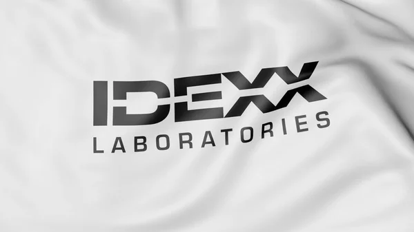 Bandiera sventolante con logo Idexx Laboratories. Rendering editoriale 3D — Foto Stock