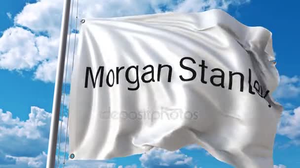 Mengayunkan bendera dengan logo Morgan Stanley melawan awan bergerak. Animasi editorial 4K — Stok Video
