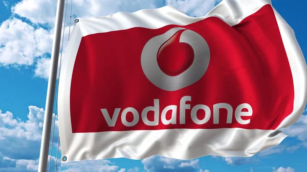 Bandiera sventolante con logo Vodafone contro cielo e nuvole. Rendering editoriale 3D — Foto Stock