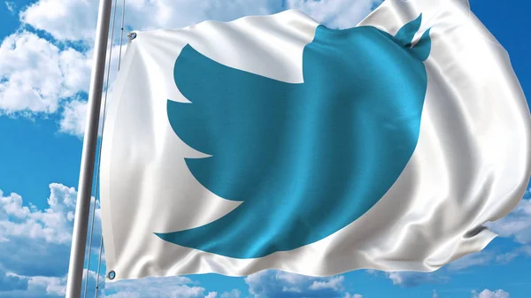 Bandera ondeando con el logotipo de Twitter contra cielo y nubes. Representación Editorial 3D — Foto de Stock