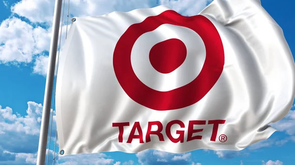 Bandera ondeando con logo Target contra cielo y nubes. Representación Editorial 3D — Foto de Stock