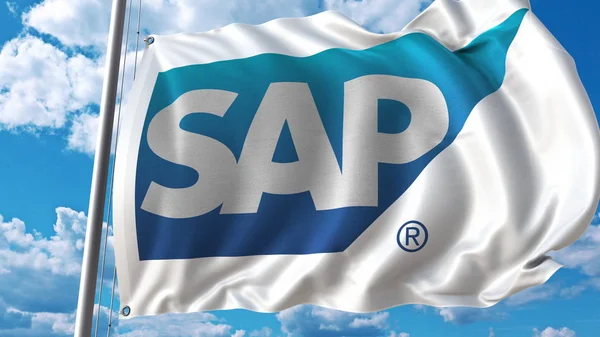 Ondeando bandera con el logotipo de SAP contra el cielo y las nubes. Representación Editorial 3D —  Fotos de Stock