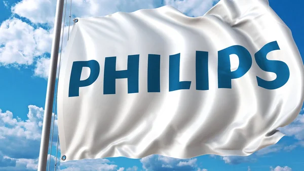 Drapeau arborant le logo Philips contre le ciel et les nuages. Editorial rendu 3D — Photo