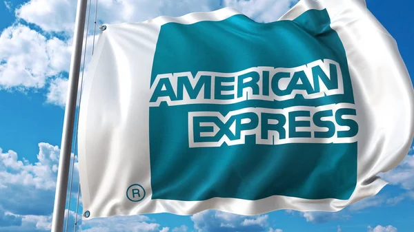 Integetett zászló ellen sky és clouds American Express logóval. Szerkesztői 3d-leképezés — Stock Fotó