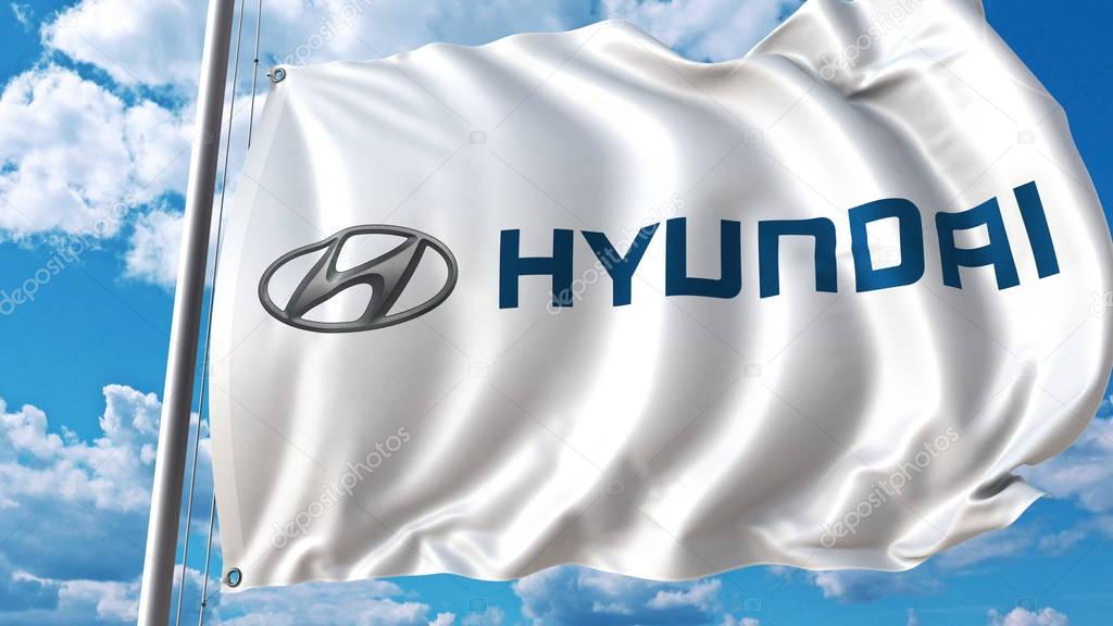 Waving flag with Hyundai logo against sky and clouds. Editorial 3D