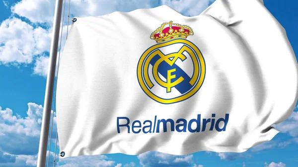 Viftande flagga med Real Madrid fotboll team logo. Redaktionella 3d-rendering — Stockfoto