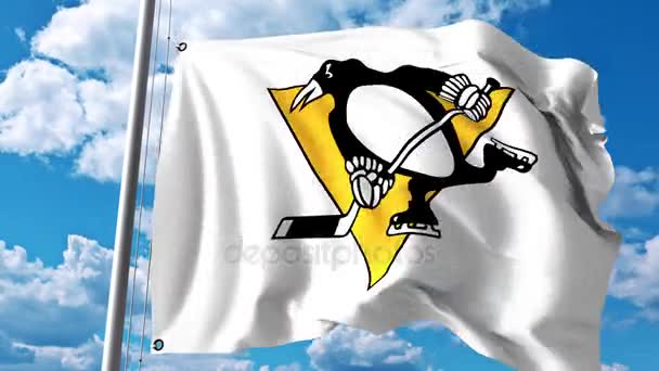 Macha flagą z logo drużyny hokeja Pittsburgh Penguins Nhl. 4 k Video Redakcja — Wideo stockowe