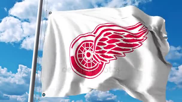 Bandera ondeando con el logotipo del equipo de hockey NHL de Detroit Red Wings. Clip editorial 4K — Vídeos de Stock
