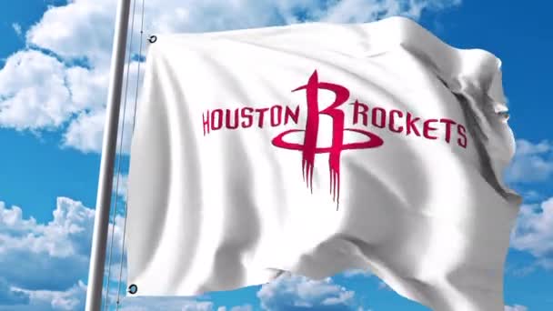 Vlající vlajka s logem profesionálního týmu Houston Rockets. 4 k redakční klip — Stock video