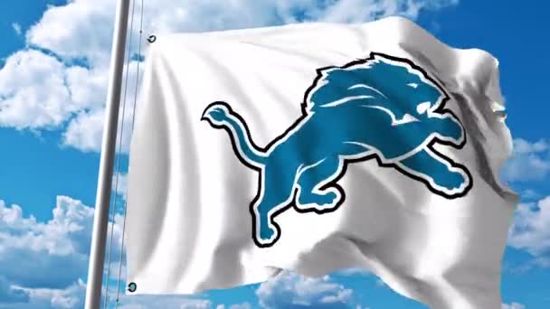 Macha flagi z logo profesjonalny zespół Detroit Lions. 4 k Video Redakcja — Wideo stockowe