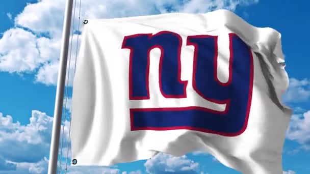 Bandera ondeando con el logotipo del equipo profesional de New York Giants. Clip editorial 4K — Vídeos de Stock