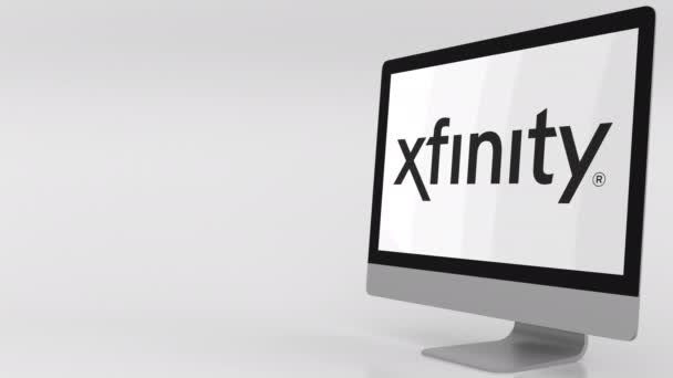 Moderní počítačová obrazovka s logem Xfinity. 4 k redakční klip — Stock video