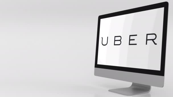 Modern datorskärm med Uber-logotypen. 4 k redaktionella klipp — Stockvideo